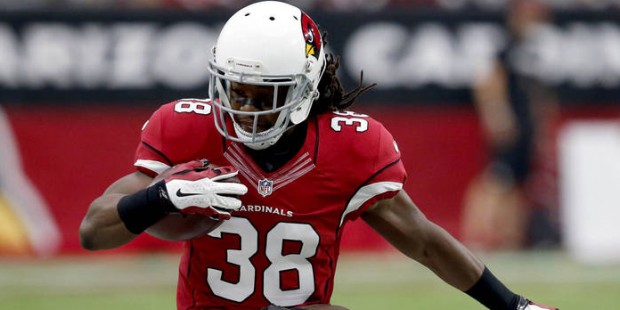 Arizona Cardinals running back Andre Ellington (38) is hit by New Orleans Saints defensive back Del...