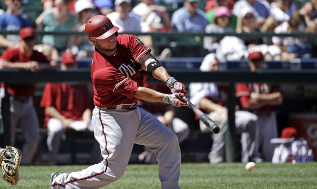 Arizona Diamondbacks' Welington Castillo grounds the ball to the infield in the sixth inning of a b...