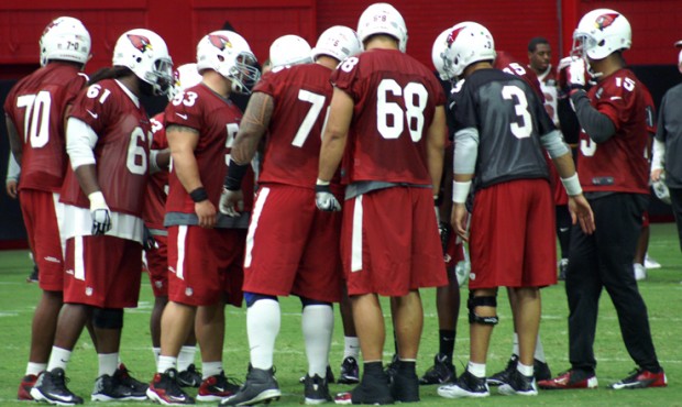QB Carson Palmer leads the huddle during Arizona Cardinals training camp Sunday, Aug. 2. (Photo by ...