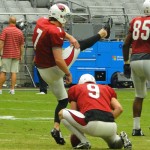 Kicker Chandler Catanzaro follows through at Arizona Cardinals Training Camp in Glendale Tuesday, August 4, 2015. (Photo: Vince Marotta/Arizona Sports)