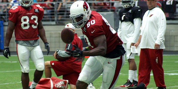 Tight end Ifeanyi Momah reels in the football during Arizona Cardinals training camp Tuesday, Aug. ...