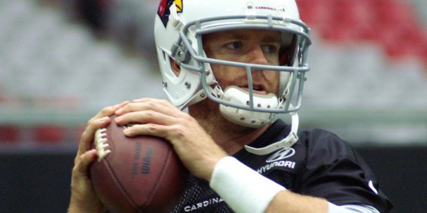 Carson Palmer prepares to throw during Cardinals training camp. (Photo by Adam Green/Arizona Sports...