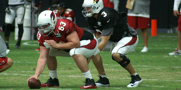 Lyle Sendlein prepares to snap the ball to QB Carson Palmer during Arizona Cardinals training camp ...