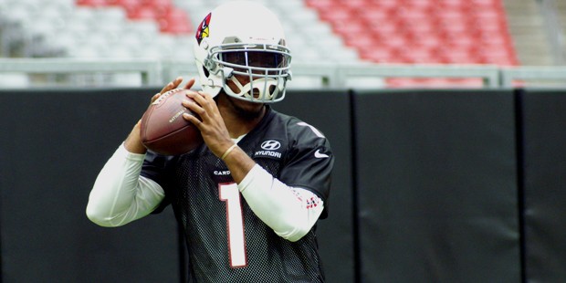 QB Phillip Sims goes through a drill during Arizona Cardinals training camp. (Photo by Adam Green/A...