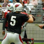 QB Drew Stanton delivers a pass as head coach Bruce Arians looks on at Arizona Cardinals Training Camp in Glendale Tuesday, August 4, 2015. (Photo: Vince Marotta/Arizona Sports)