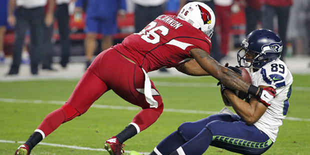 Arizona Cardinals strong safety Deone Bucannon (36) hits Seattle Seahawks wide receiver Doug Baldwi...