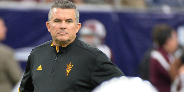 Arizona State head coach Todd Graham  watches his team before an NCAA college football game on Satu...