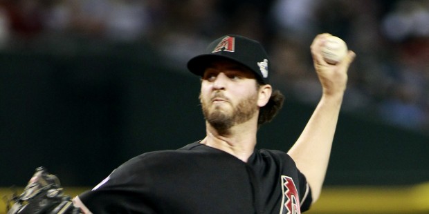 Arizona Diamondbacks' Keith Hessler delivers a pitch against the Cincinnati Reds during the eighth ...