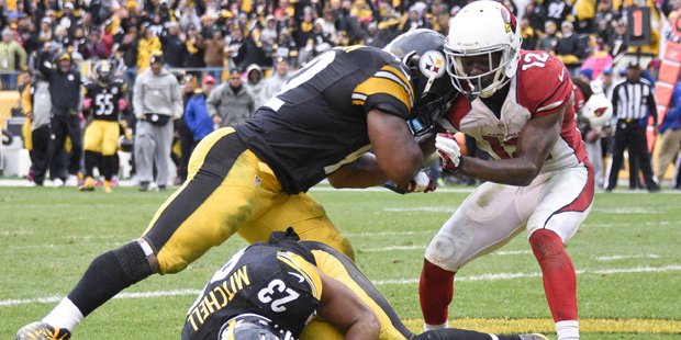 Pittsburgh Steelers outside linebacker James Harrison (92) blocks Arizona Cardinals wide receiver J...