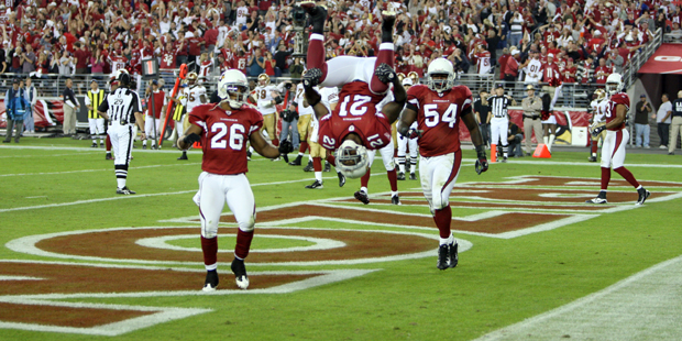 Arizona Cardinals Antrel Rolle #21 performs a backflip in the endzone in the fourth quarter of an N...