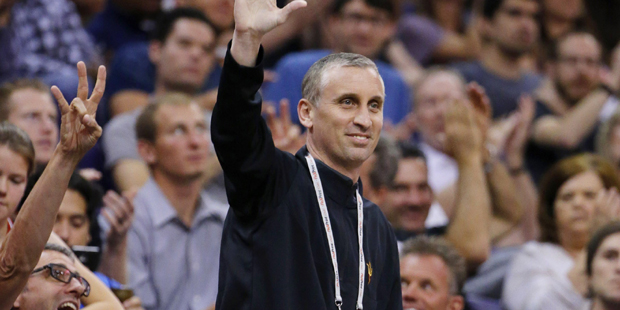 New Arizona State men's basketball head coach Bobby Hurley waves to the crowd as he attends the fir...