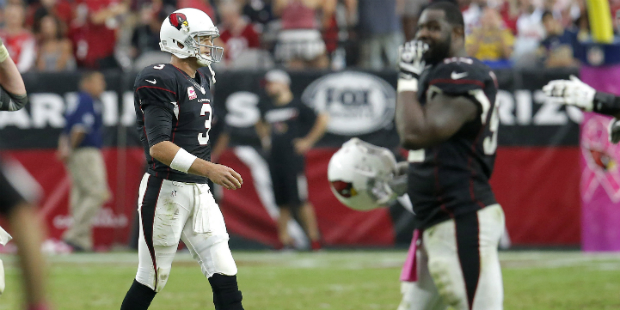 Arizona Cardinals quarterback Carson Palmer (3) walks off the field after an NFL football game agai...