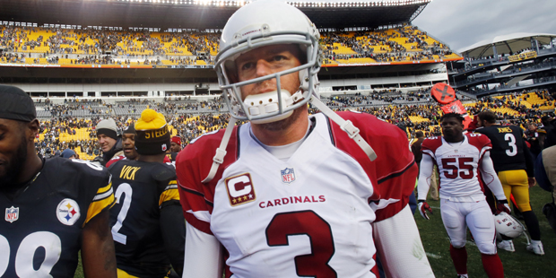 Arizona Cardinals quarterback Carson Palmer (3) walks off the field after an NFL football game agai...
