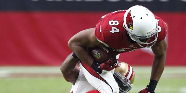 Arizona Cardinals tight end Jermaine Gresham (84) is hit by San Francisco 49ers inside linebacker N...