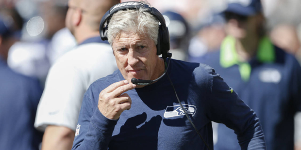 Seattle Seahawks head coach Pete Carroll works the sideline in the first half of an NFL football ga...