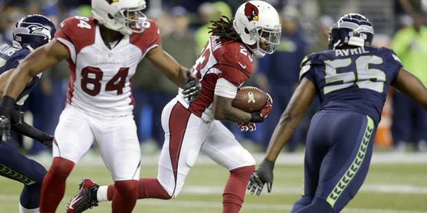 Arizona Cardinals running back Chris Johnson (23) runs the ball against Seattle Seahawks defensive ...