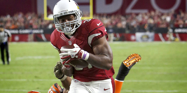 Arizona Cardinals running back David Johnson (31) runs past Chicago Bears safety Adrian Amos (38) f...