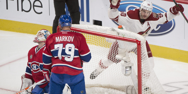 Arizona Coyotes' Antoine Vermette celebrates a goal by teammate Oliver Ekman-Larsson (not shown) on...