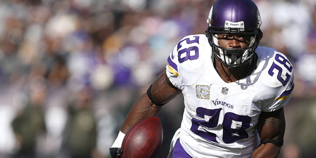 FILE - In this Sunday, Nov. 15, 2015 file photo, Minnesota Vikings running back Adrian Peterson (28...