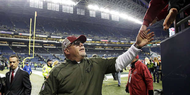Arizona Cardinals head coach Bruce Arians leaves the field after an NFL football game against the S...