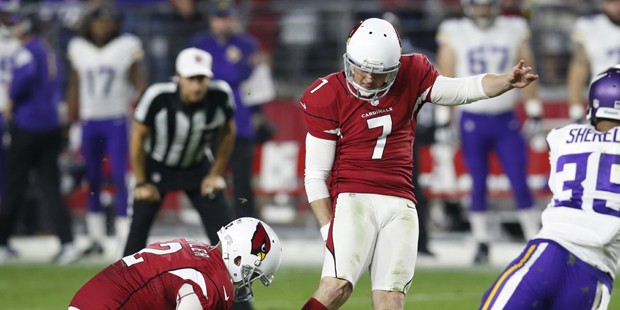 Arizona Cardinals kicker Chandler Catanzaro (7) kicks a field goal as Drew Butler (2) holds during ...