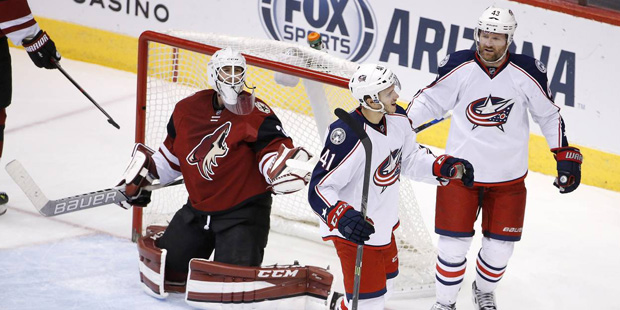 Columbus Blue Jackets' Alexander Wennberg (41), of Sweden, celebrates his goal with Scott Hartnell ...