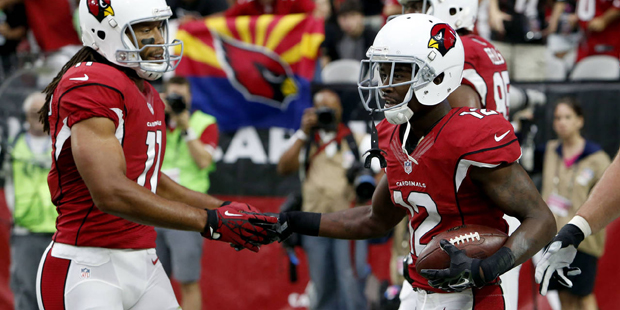 Arizona Cardinals wide receiver John Brown (12) celebrates his touchdown with teammate Larry Fitzge...