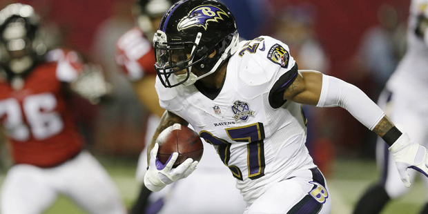 Baltimore Ravens cornerback Asa Jackson (27) runs past the Atlanta Falcons defense during the first...