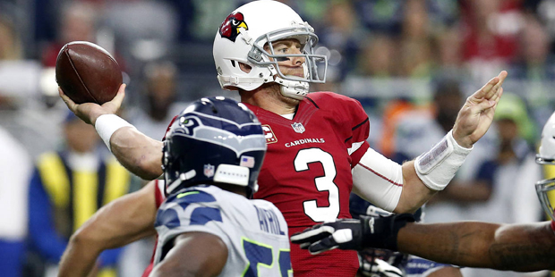 Arizona Cardinals quarterback Carson Palmer (3) throws against the Seattle Seahawks during the firs...