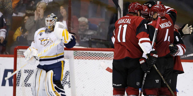 Arizona Coyotes' Tobias Rieder (8) celebrates his first goal during the third period against Nashvi...