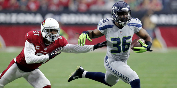Seattle Seahawks running back Bryce Brown (36) is pushed out of bounds by Arizona Cardinals cornerb...