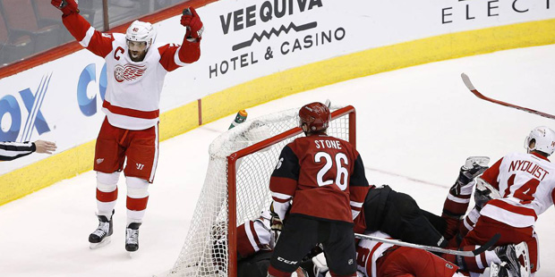 Arizona Coyotes' Anthony Duclair, middle, celebrates his goal against the Nashville Predators with ...