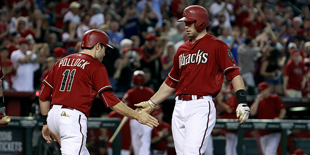 Arizona Diamondbacks' Paul Goldschmidt, right, is congratulated by teammate A.J. Pollock following ...