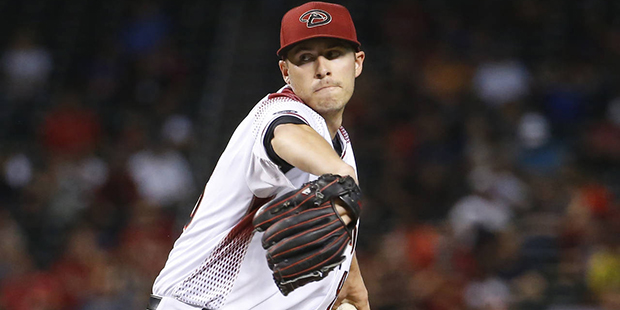 Arizona Diamondbacks starting pitcher Patrick Corbin throws during the seventh inning of a baseball...