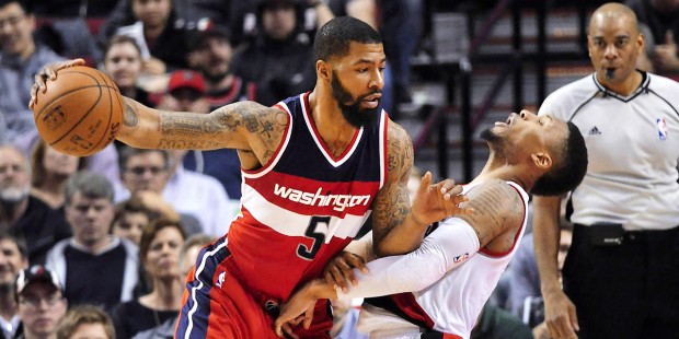 Washington Wizards forward Markieff Morris (5) drives into Portland Trail Blazers guard Damian Lill...