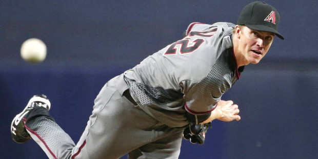 Arizona Diamondbacks starting pitcher Zack Greinke throws to a San Diego Padres batter during the f...