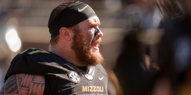 Missouri offensive lineman Evan Boehm screams at teammates during warmups before their NCAA college...