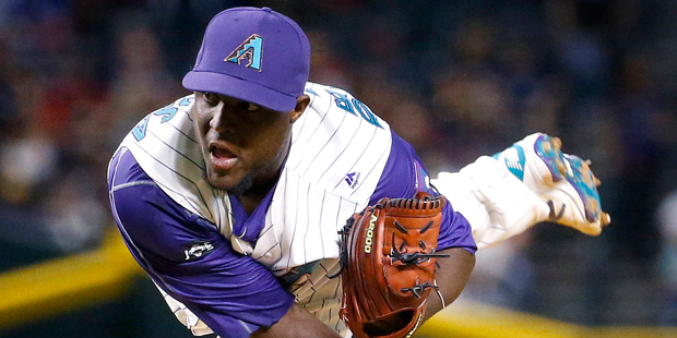 Arizona Diamondbacks starting pitcher Rubby De La Rosa (12) throws during the seventh inning of a b...