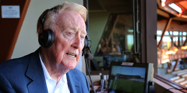 Legendary Los Angeles Dodgers broadcaster Vin Scully sits in the booth at Camelback Ranch Glendale,...