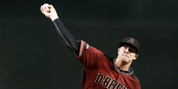 Arizona Diamondbacks starting pitcher Archie Bradley throws in the first inning during a baseball g...