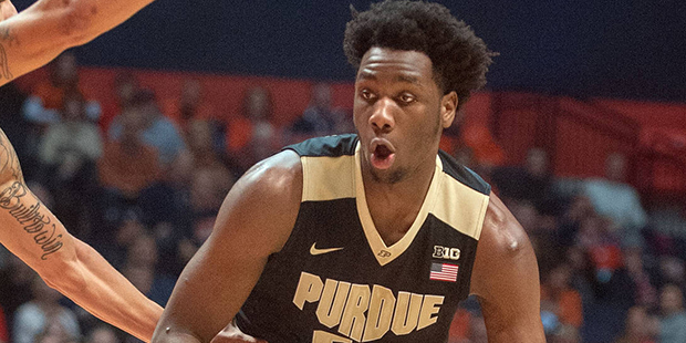 Purdus forward Caleb Swanigan (50) drives on Illinois guard Khalid Lewis during the second half of ...