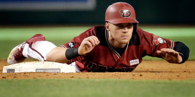 Arizona Diamondbacks' Brandon Drury, right, high-fives teammate Jean Segura (2) after hitting a two...