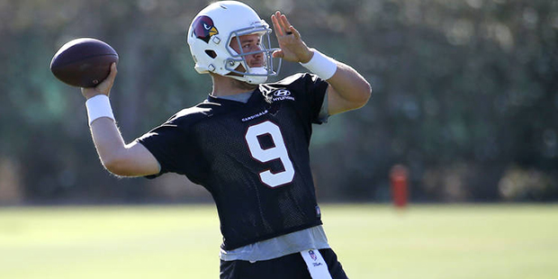 Arizona Cardinals' quarterback Matt Barkley (9) throws a pass  during NFL football practice, Tuesda...