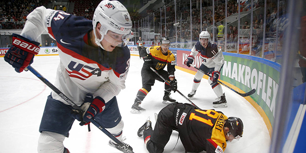 FILE - In this May 15, 2016 file photo, United States' Auston Matthews, left, fights for the puck w...
