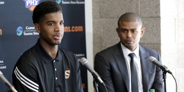 Phoenix Suns' first-round draft pick Marquese Chriss, left, speaks as head coach Earl Watson listen...
