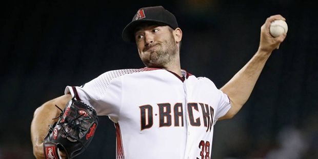 Arizona Diamondbacks' Robbie Ray throws a pitch against the Tampa Bay Rays during the first inning ...