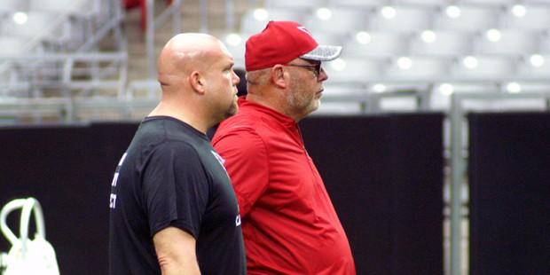 Cardinals coach Bruce Arians and GM Steve Keim watch the conditioning test at Cardinals training ca...