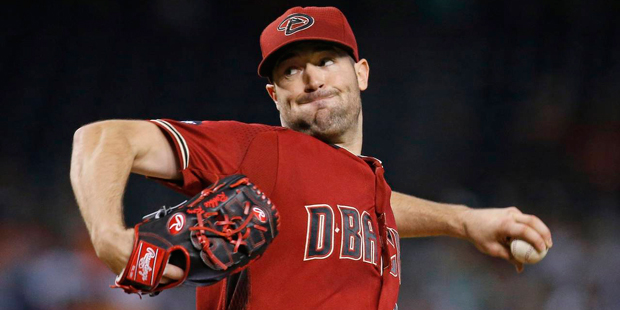 Arizona Diamondbacks' Robbie Ray throws a pitch against the San Francisco Giants during the first i...