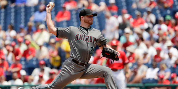 Arizona Diamondbacks' Shelby Miller pitches during the first inning of a baseball game against the ...