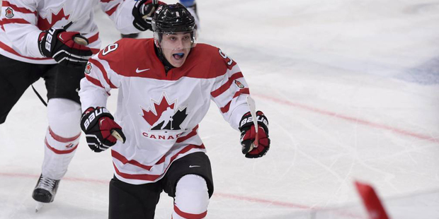Julien Gauthie (left) and Dylan Strome of Canada celebrating after Strome scored the second goal of...